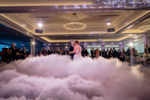 Newlyweds dancing on the cloud at Crystal Point Yacht Club
