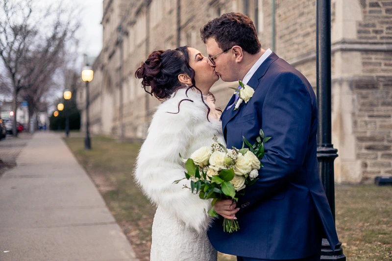 A romantic Kiss at Nassau Inn Princeton wedding photos