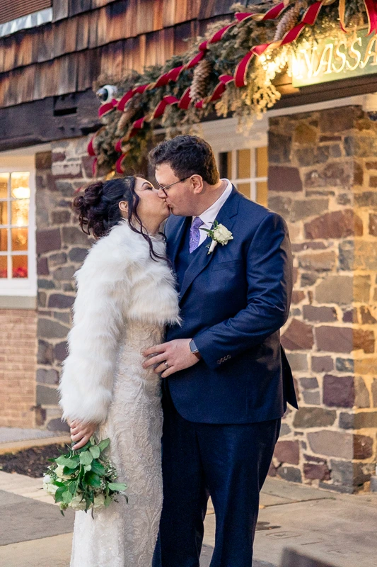 Newlyweds kissing at Nassau Inn Princeton wedding photos