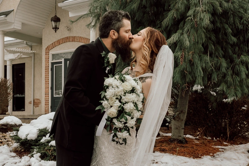 A Winter Wonderland Kiss at Sand Springs Country Club wedding photos