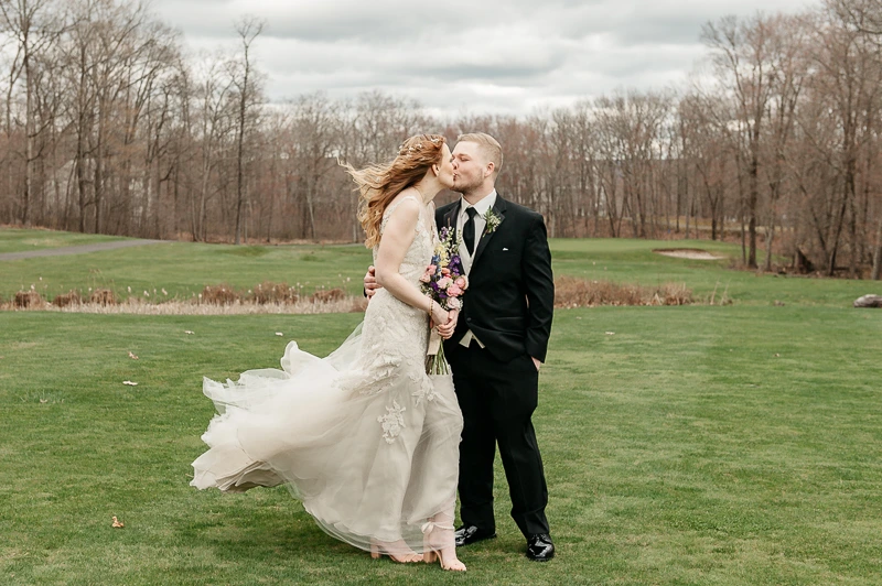 A Windswept Moment of Love at Sand Springs Country Club wedding photos